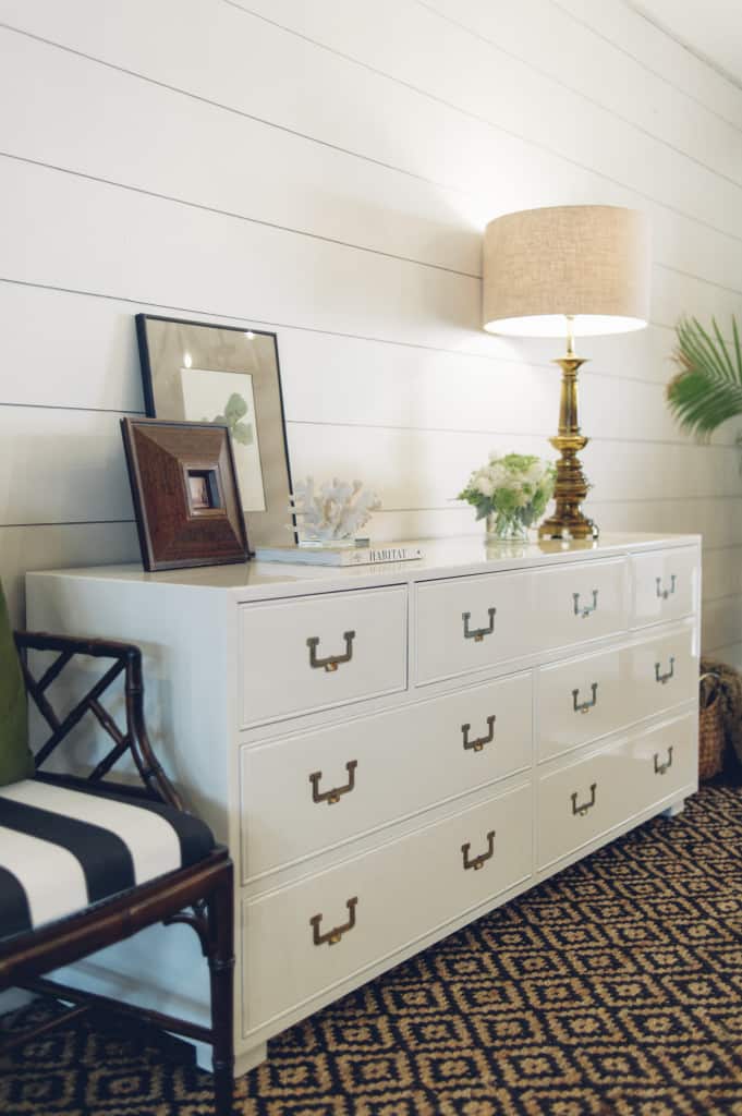 Vintage Henredon Artefacts Campaign dresser with brass hardware painted with high gloss oil enamel Fine Paints of Europe Hollandlac Brilliant in Benjamin Moore White Dove shiplap walls Chinese Chippendale chair Lacy Tomlinson Photography