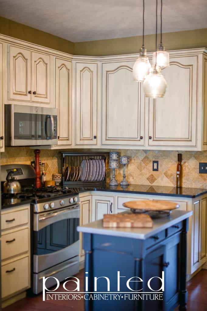 Cream cabinets with an antique brown Glaze!