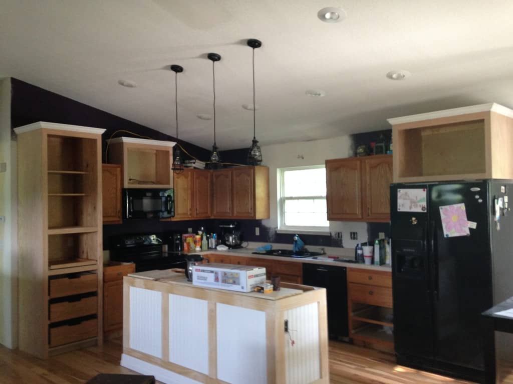 before and after of gray kitchen cabinets