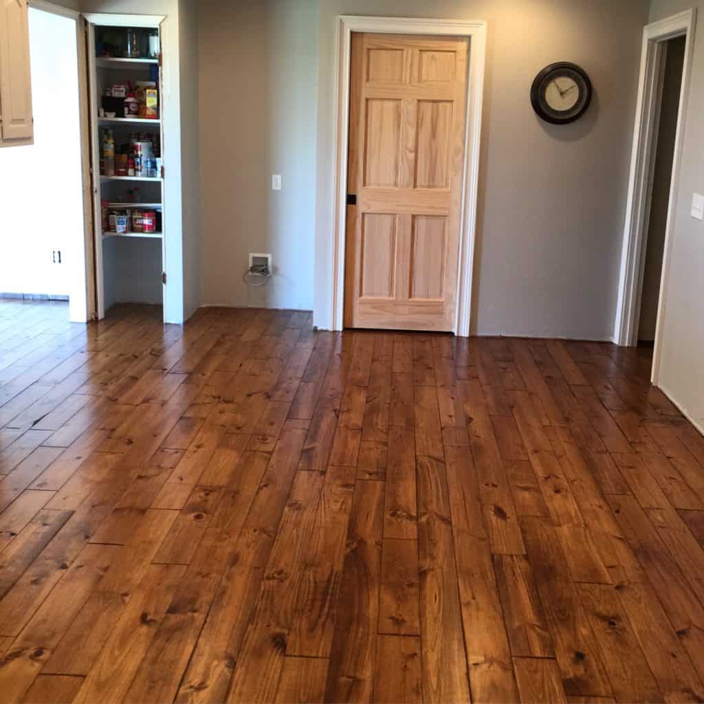 Minwax Early American stain on Pine.  Solid Hardwood flooring in Kitchen