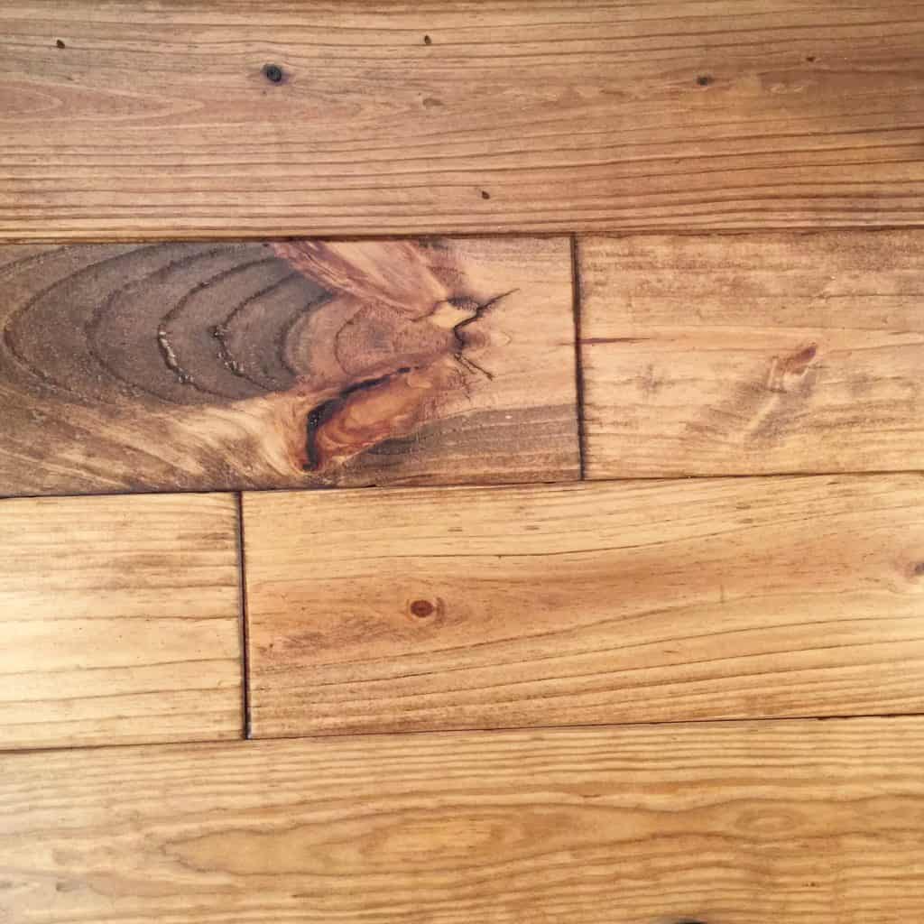 Minwax Early American stain on Pine.  Solid Hardwood flooring in Kitchen