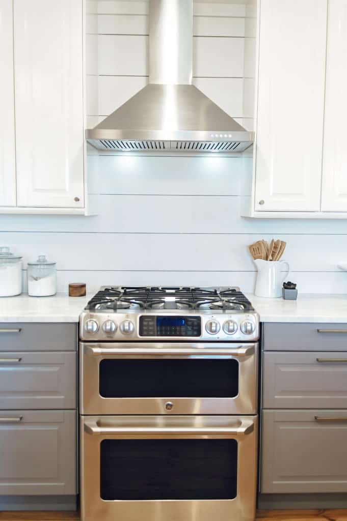 GE Cafe series gas range and double oven. IKEA Bodbyn cabinets in Gray and White