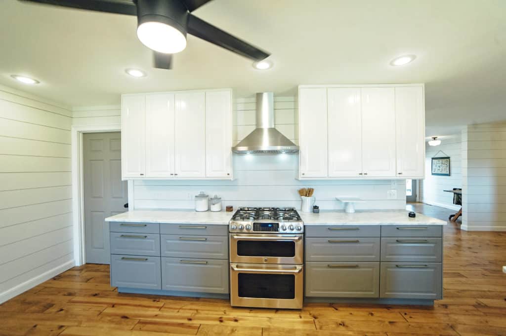 Ikea Bodbyn cabinets in gray and white in two tone kitchen