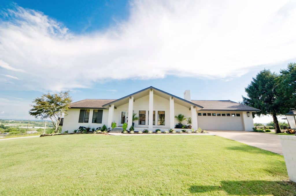 Beautifully renovated painted brick, ranch style house.