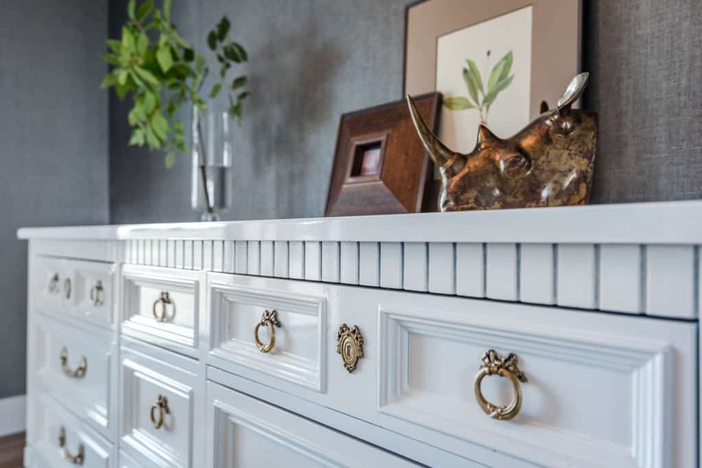 Unique furniture hardware on vintage dresser.