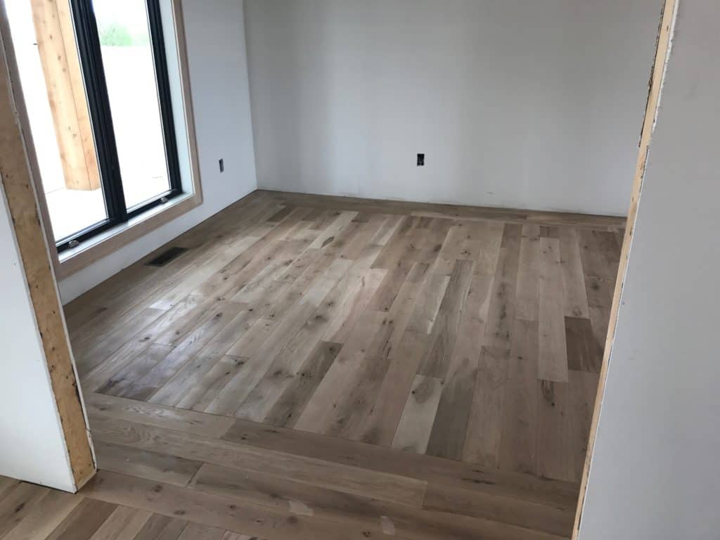 White Oak solid hardwood flooring in formal dining room.
