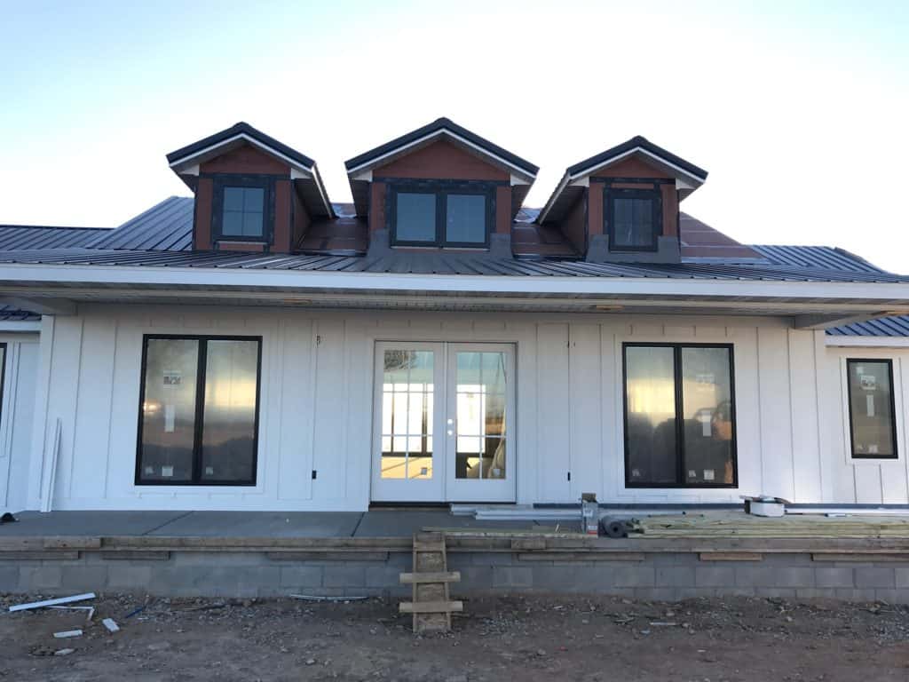 Progress of our board and batten siding on the farmhouse