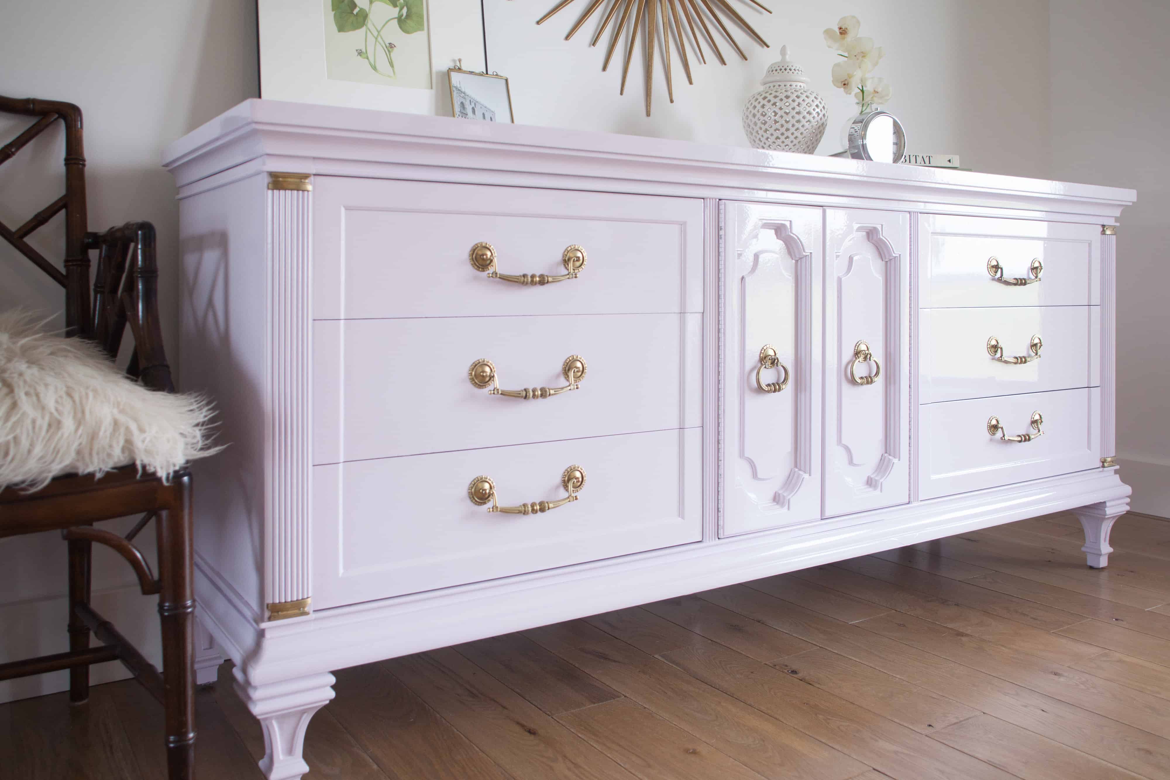 Vintage dresser refinished in high gloss lilac. Perfect for a chic nursery!