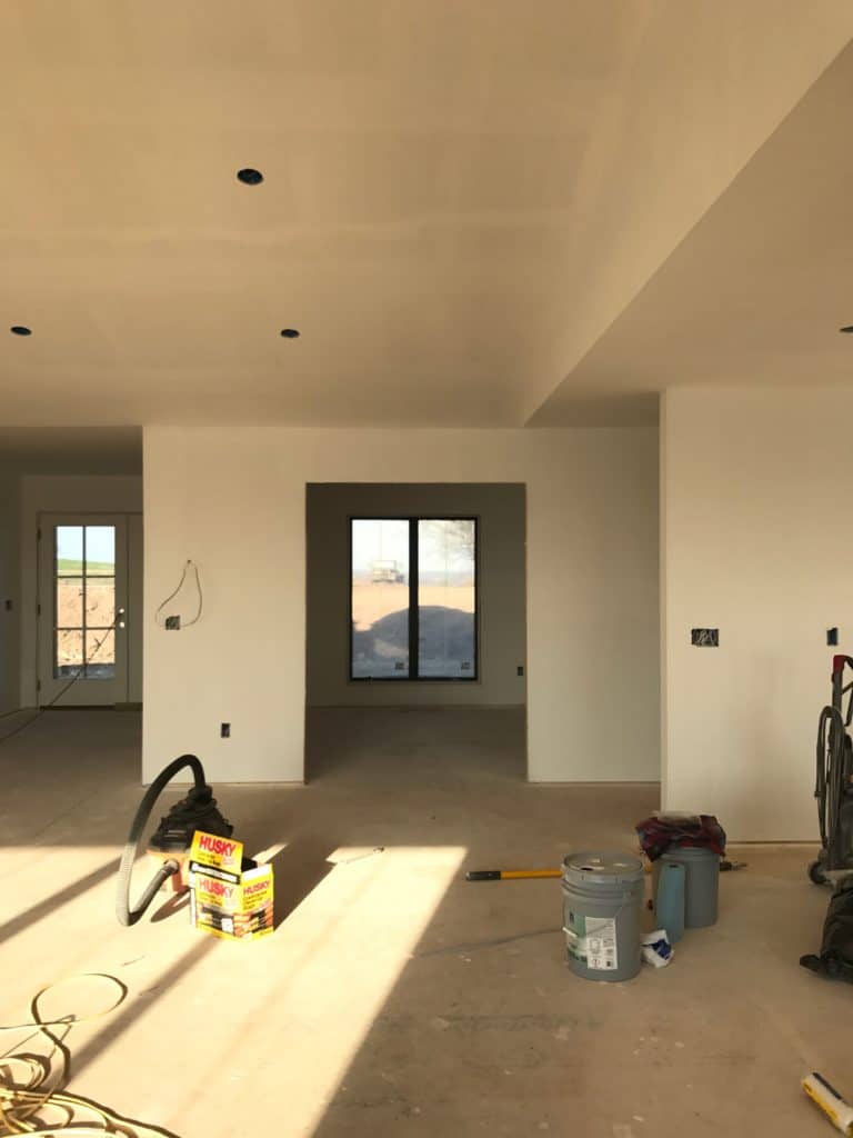 Formal dining room off the living room.  Sheetrock complete