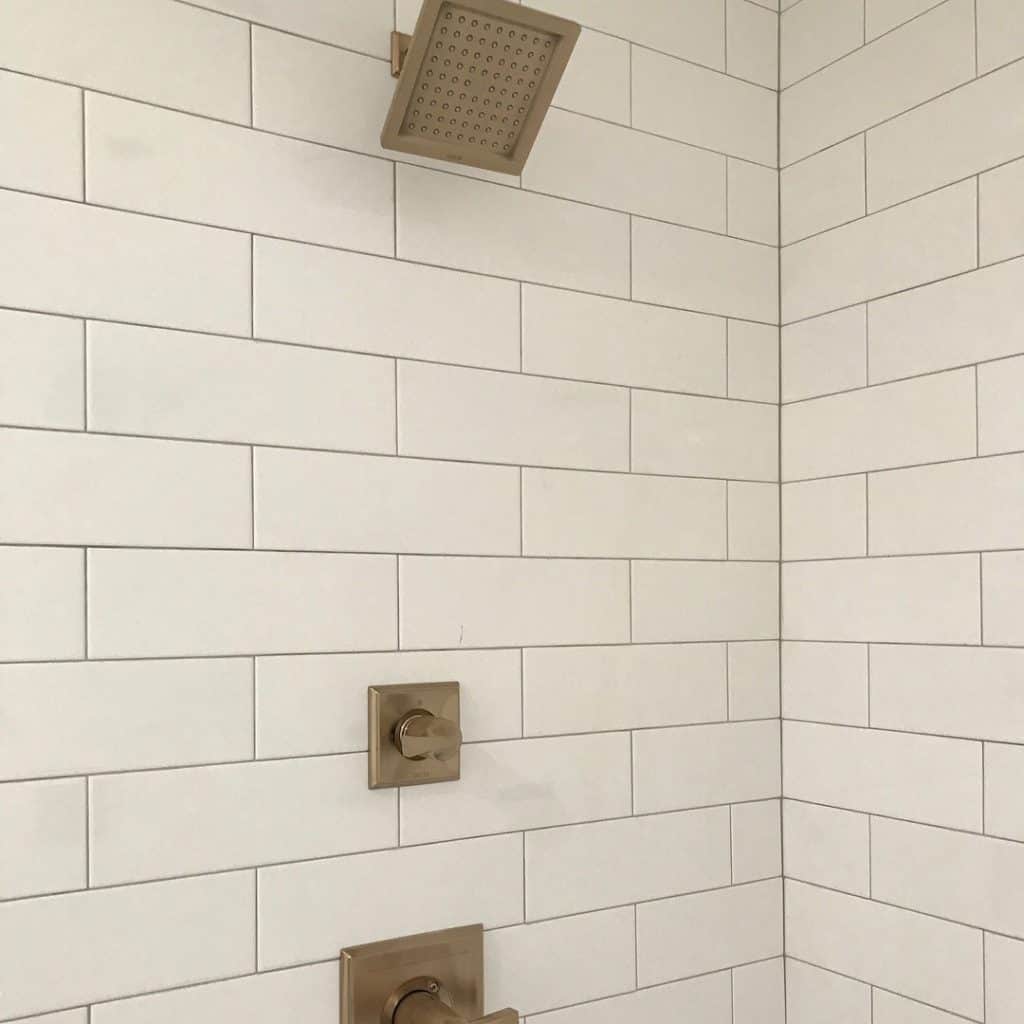 Delta shower fixtures in Champagne Bronze