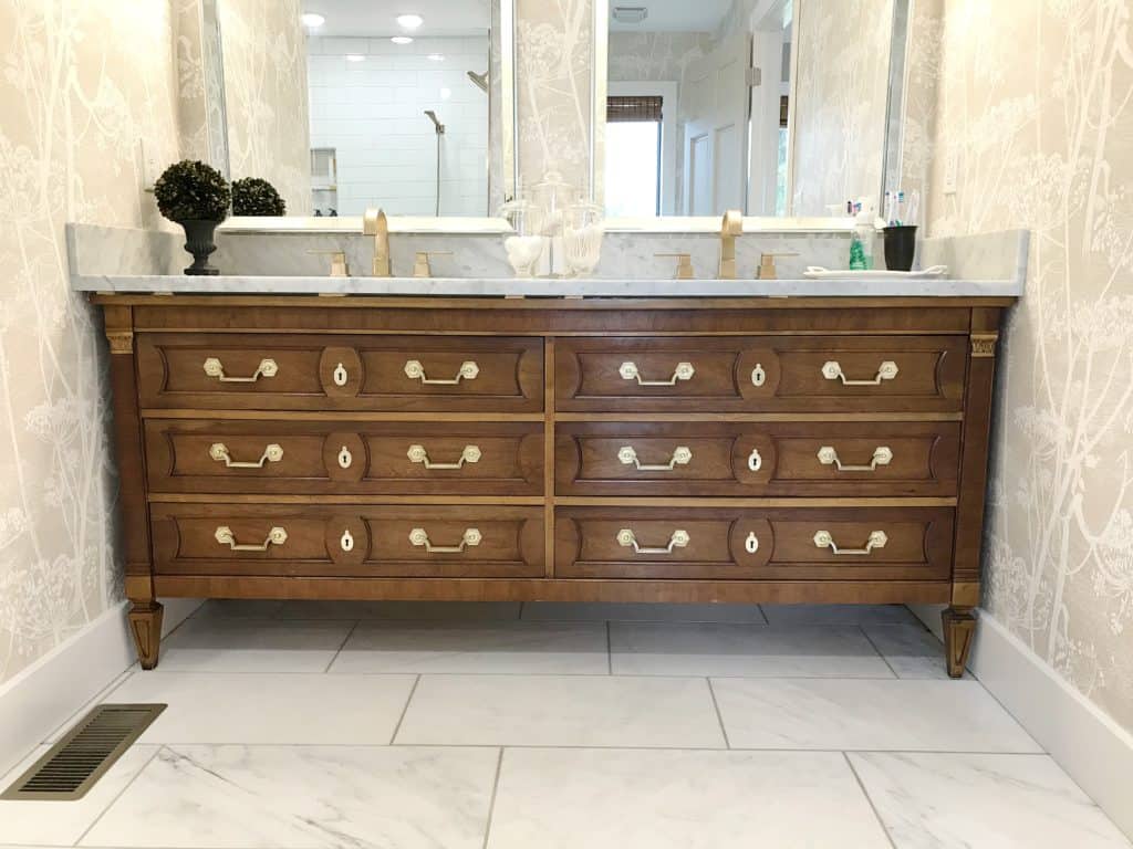 Polished brass hardware on vintage Thomasville Dresser