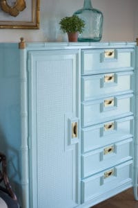 Stanley faux bamboo chest of drawers lacquered in custom shade of high gloss aqua. Polished brass campaign hardware makes this vintage piece of furniture pop!