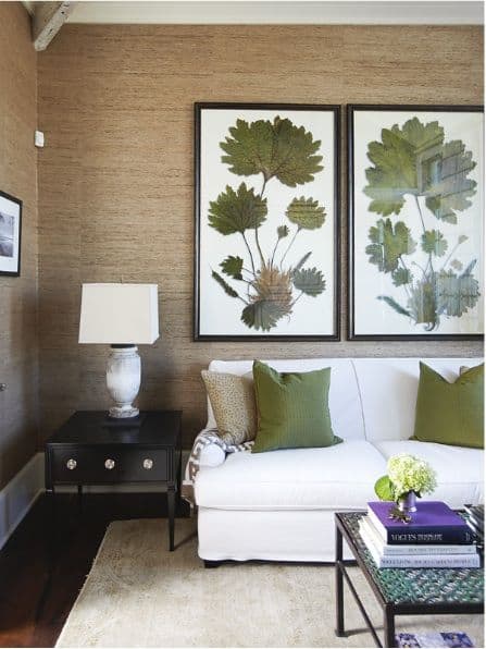 Huge botanical prints in grasscloth covered living room. Gorgeous!