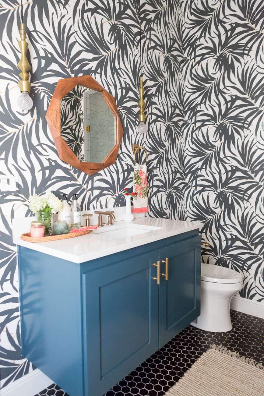 CC and Mike's pool bathroom reveal with fabulous black and white leaves wallpaper!