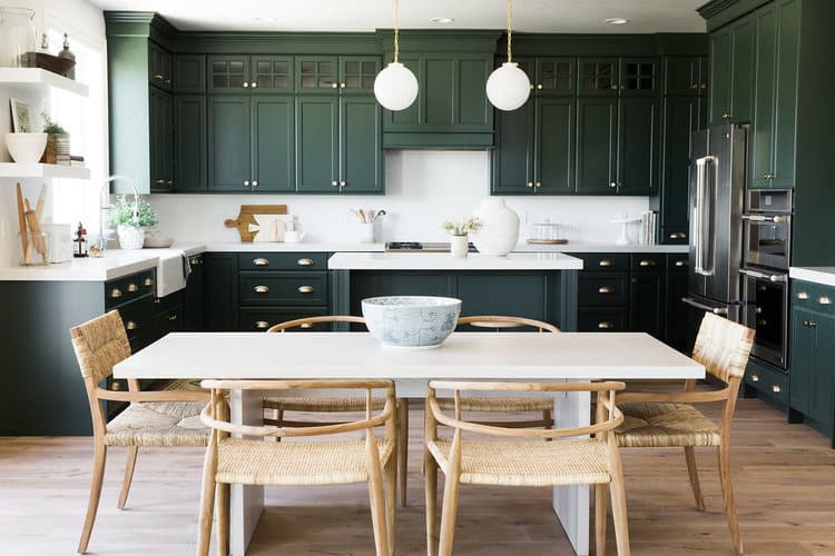 Dark green cabinets in this kitchen designed by Studio McGee is so GOOD!! Darker cabinets colors will be all the rage in 2018!