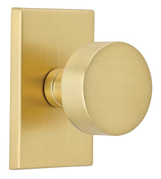Matte brass modern round door knob by Emtek