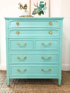 Vintage Drexel dresser painted in Sherwin Williams Holiday Turquoise makes a bold statement with its bright punch of turquoise