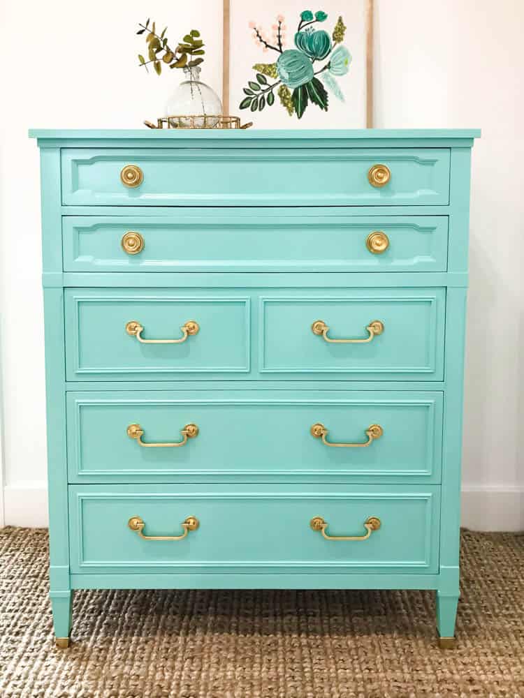 Vintage Drexel dresser painted in Sherwin Williams Holiday Turquoise makes a bold statement with its bright punch of turquoise 