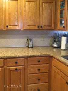 Bye Bye Honey Oak! See how this kitchen looks after it's new paint job!