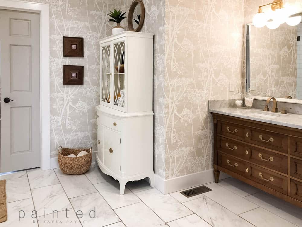 Cole and Son Cow Parsley wallpaper in modern traditional master bathroom. Great storage ideas to hide all of the bathroom essentials