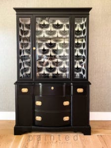 Modern black china cabinet. small black painted hutch. how to put wallpaper in furniture. how to paint furniture black. best black paint for furniture