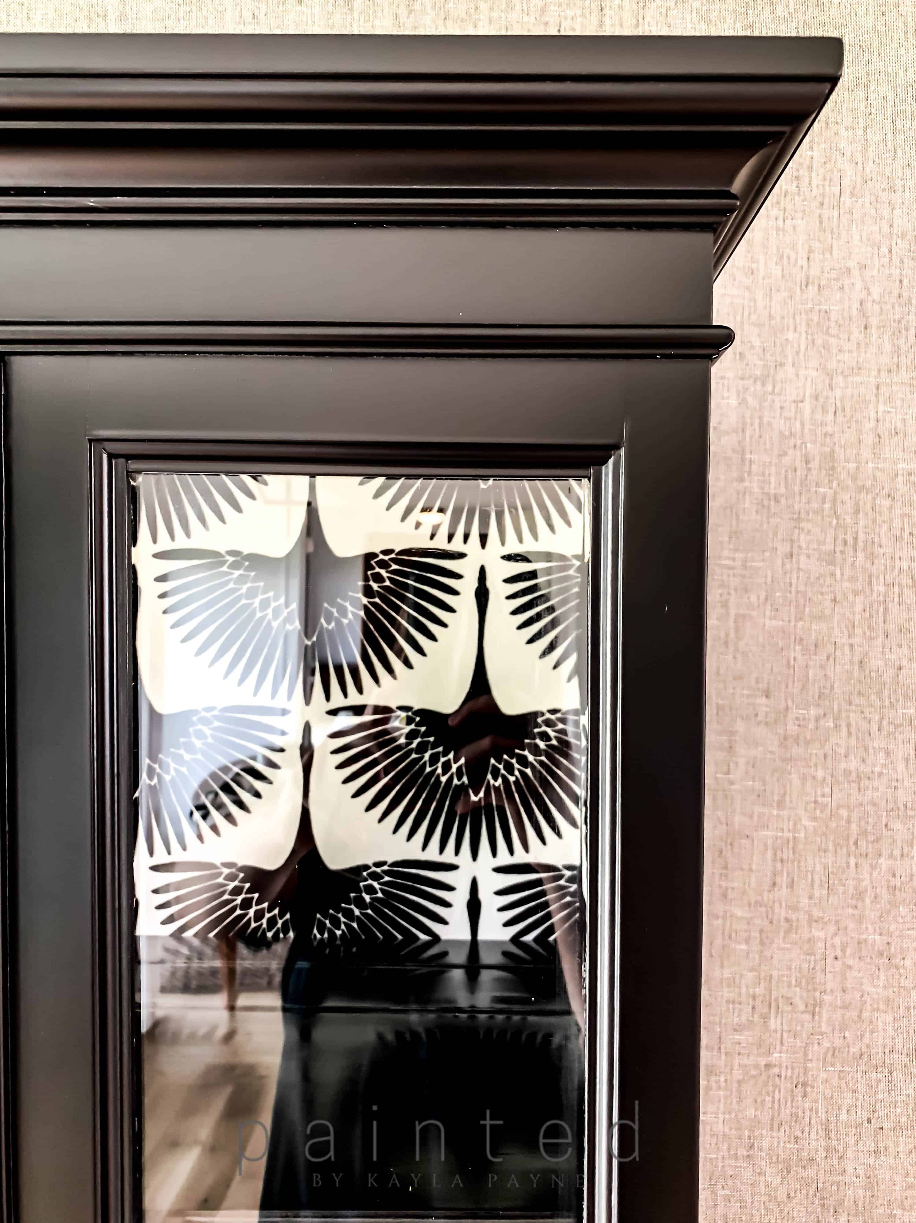 Modern black painted china cabinet. small black painted hutch. how to put wallpaper in furniture. how to paint furniture black. best black paint for furniture. Fine paints of europe hollandlac satin. Best satin paint for furniture. How to spray silky smooth satin paint