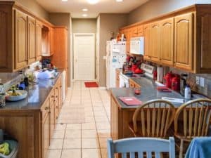 How to paint your 90's oak kitchen cabinets to give your home a modern update!