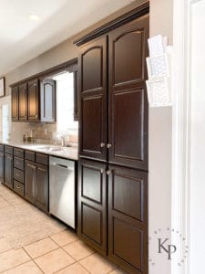 Dark espresso kitchen cabinets with light granite countertops. Not everyone wants white cabinets!