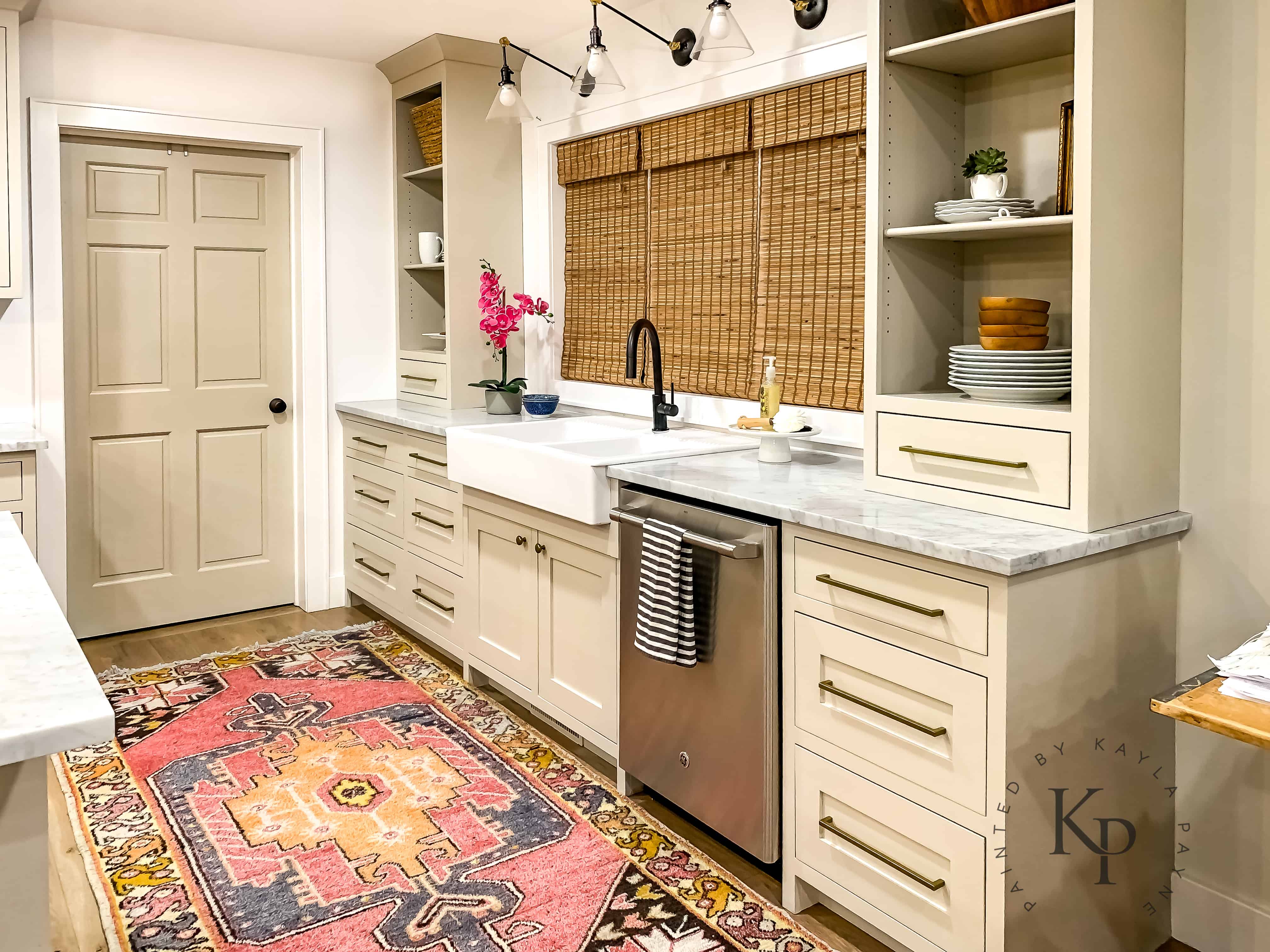 Revere Pewter cabinets, vintage runner in front of farmhouse sink