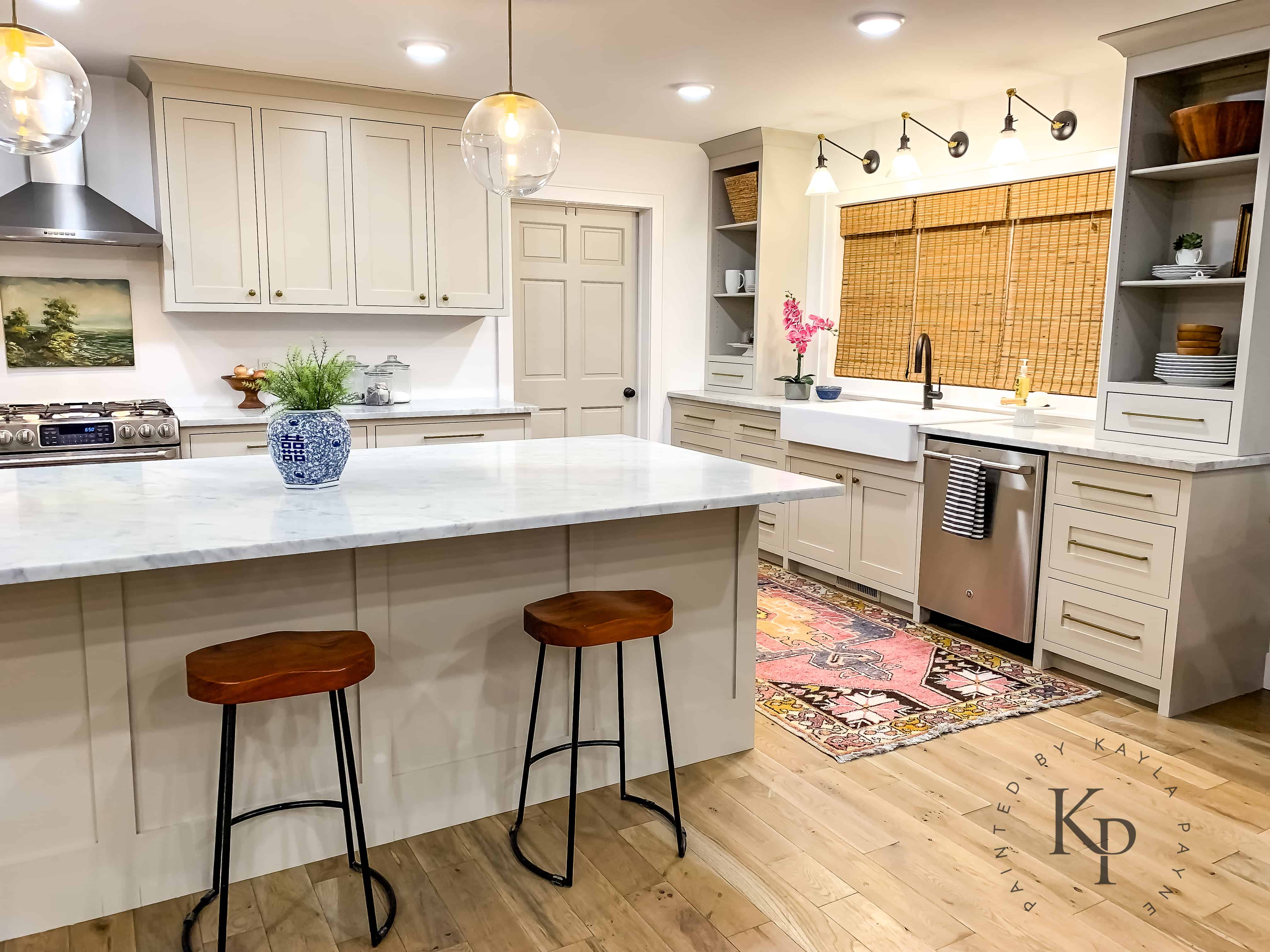 Open concept kitchen layout ideas. Kitchen cabinets in Revere Pewter by benjamin moore