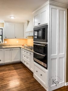 Kitchen layout ideas: Built in oven beside the cook top. Cabinets painted in Sherwin Williams Dover White