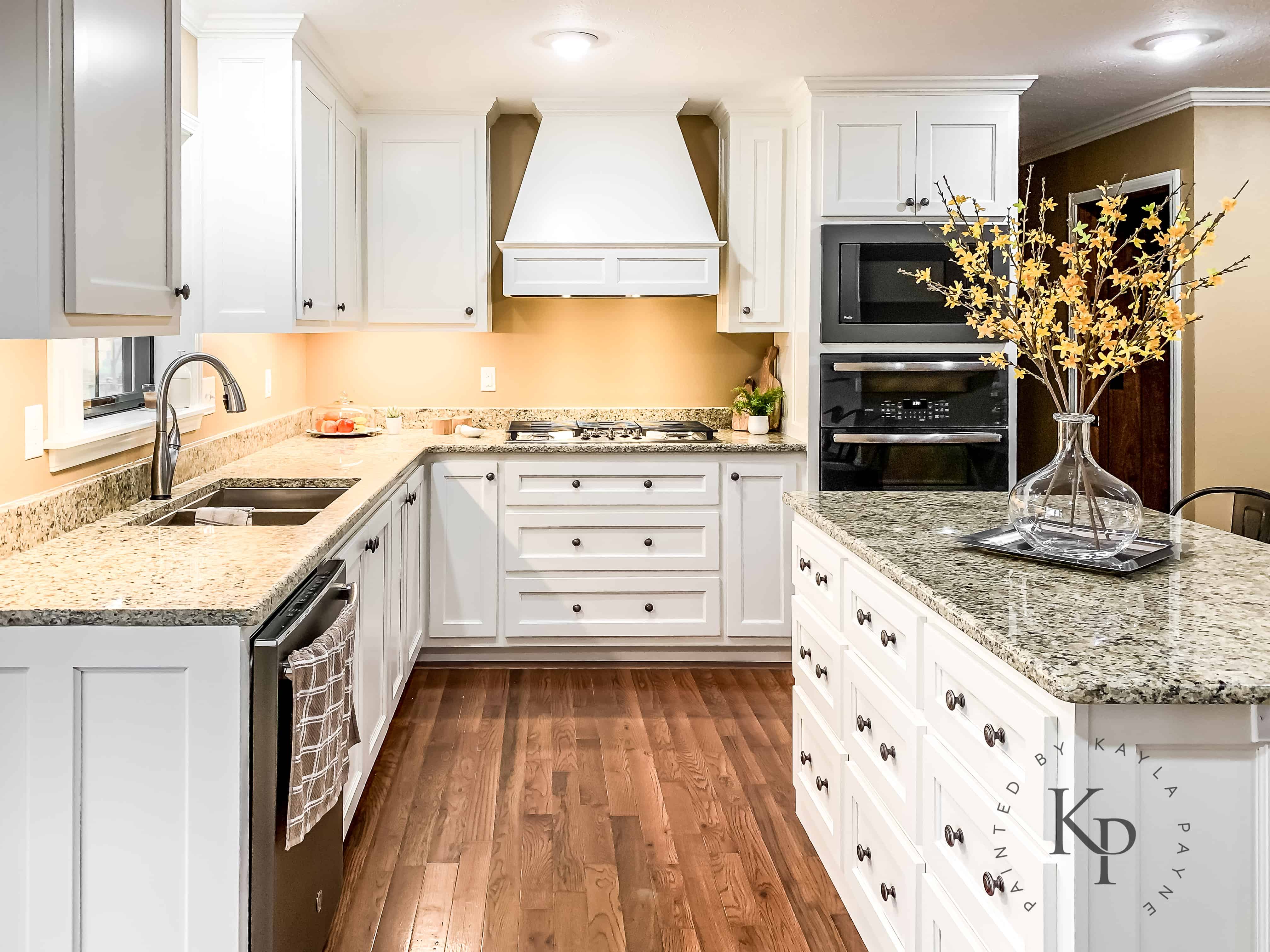 Kitchen Cabinets in Sherwin Williams Dover White - Painted by Kayla Payne