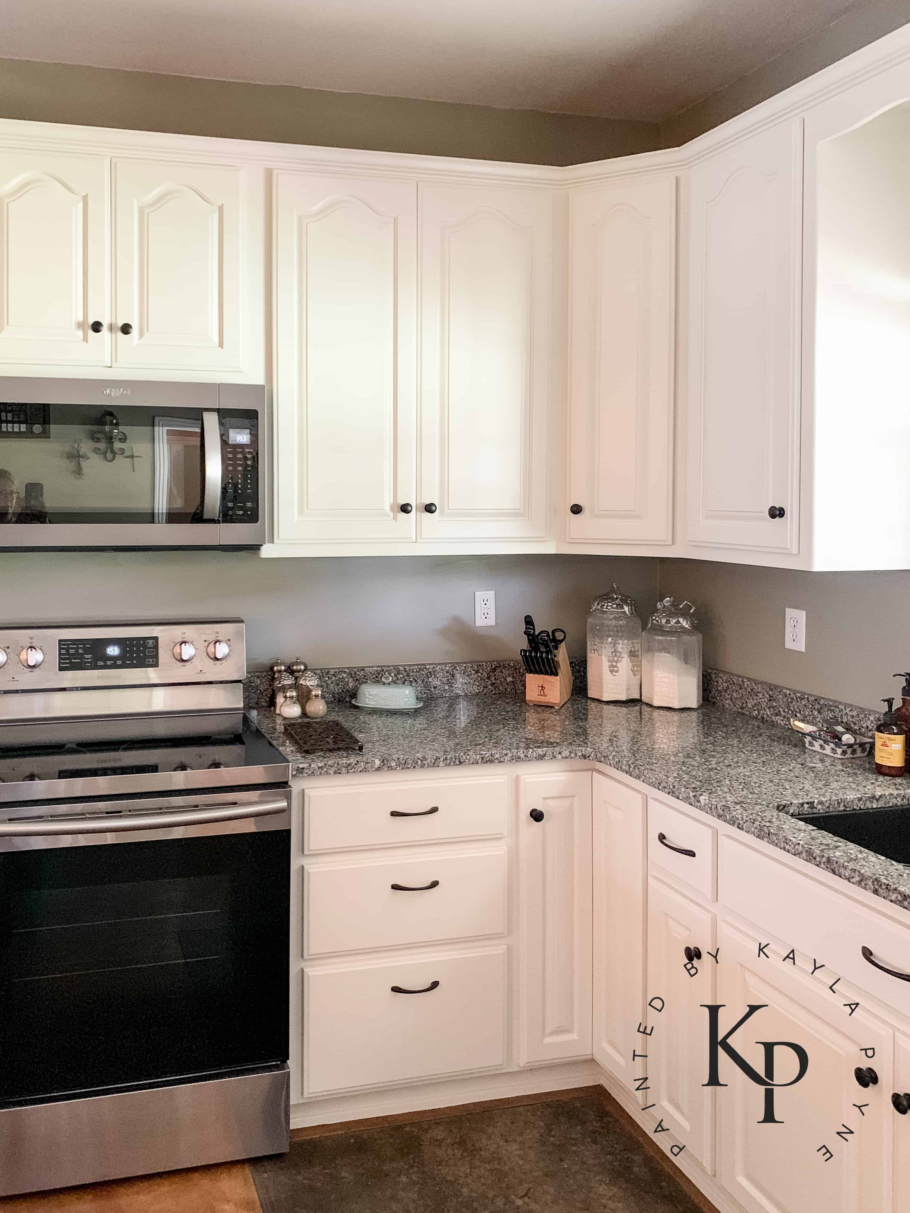 After photo of painted oak kitchen cabinets in Benjamin Moore Soft Chamois