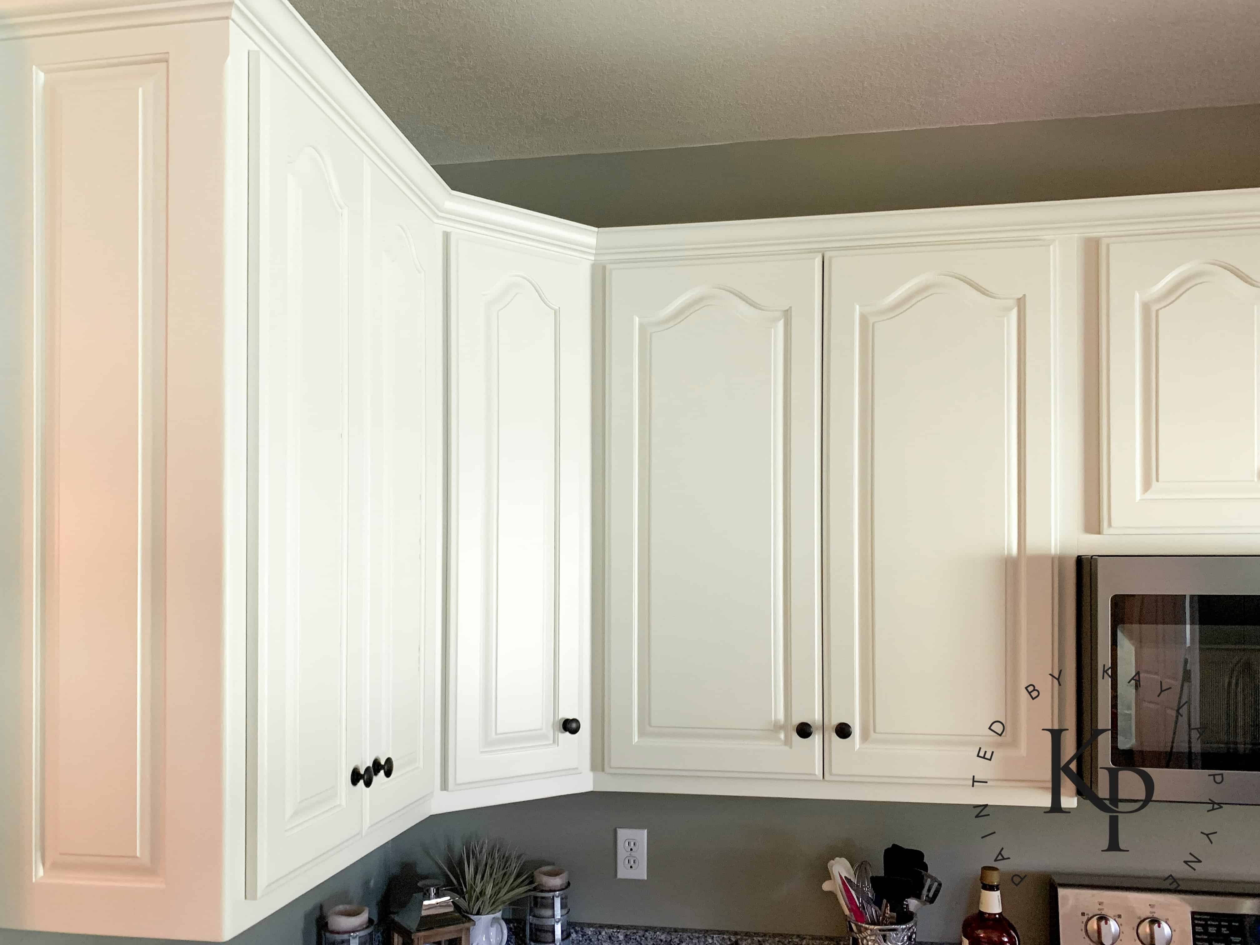 After photo of painted oak kitchen cabinets in Benjamin Moore Soft Chamois