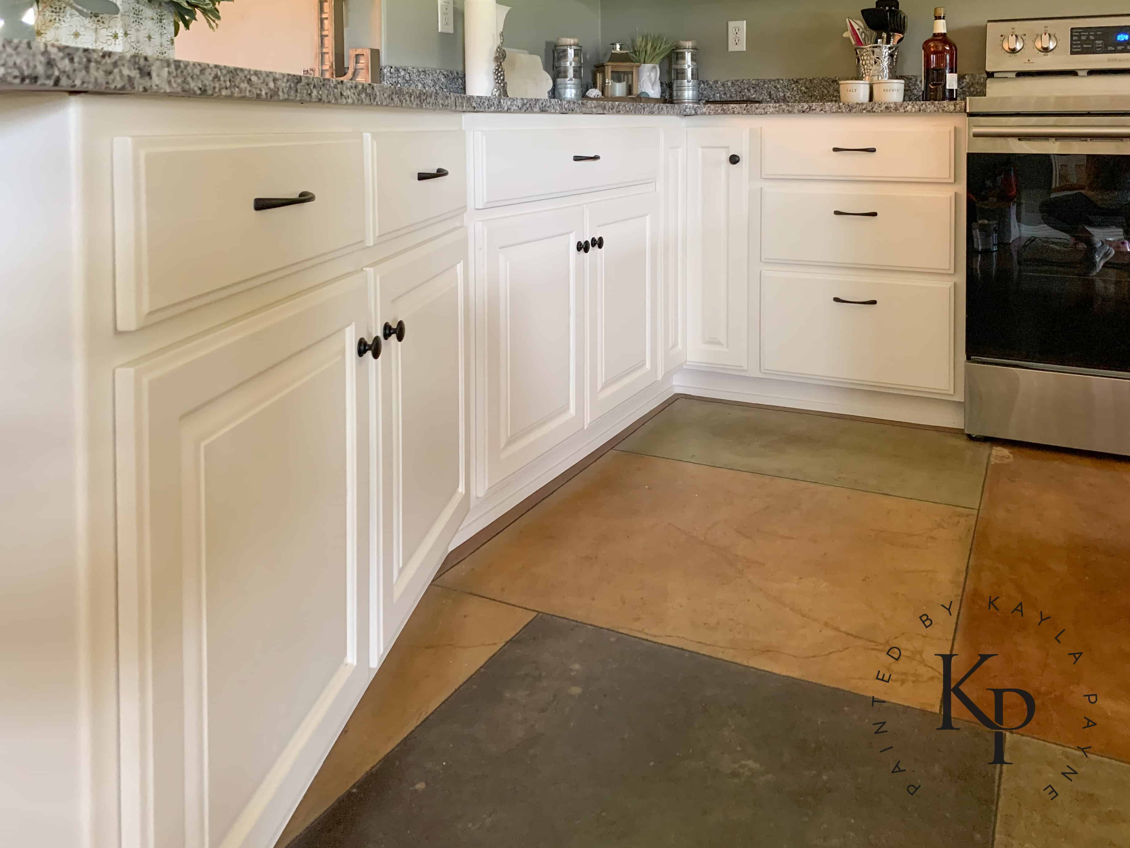 After photo of painted oak kitchen cabinets in Benjamin Moore Soft Chamois