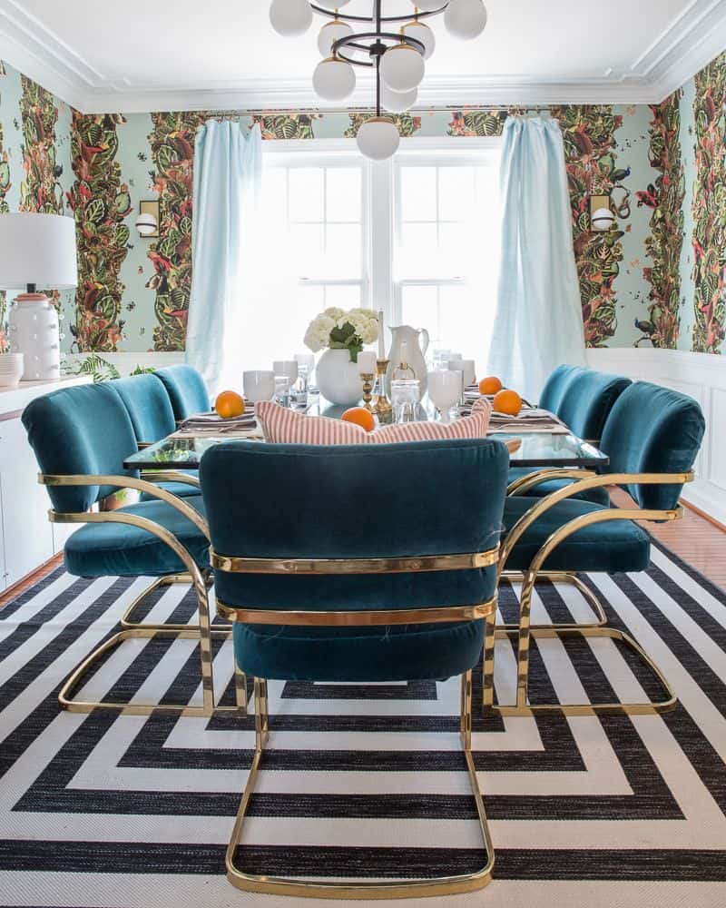 Jeweled Interiors dining room, teal dining chairs, milo baughman cantilever chairs, brass frame dining chairs, peacock blue chairs