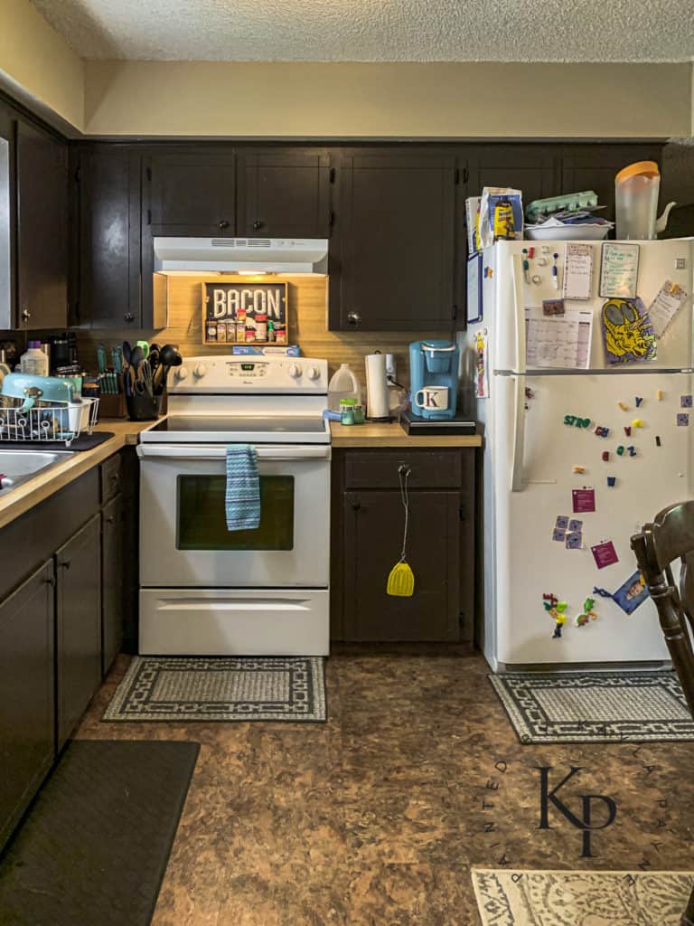 how to make a small kitchen look bigger, how to re-paint kitchen cabinets, can you paint over painted cabinets, how to fix peeling cabinet paint, badly painted cabinets, how to fix bad paint job on cabinets, do you have to strip old paint on cabinets to re-paint