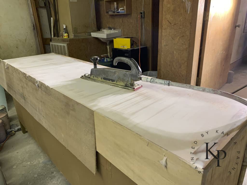 Sanding bondo with pneumatic longboard sander