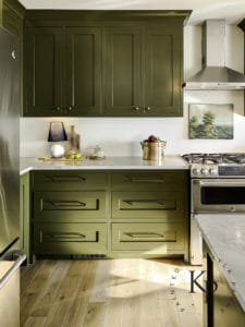 Olive green kitchen cabinets. Sherwin Williams Palm Leaf. Dark green painted cabinets