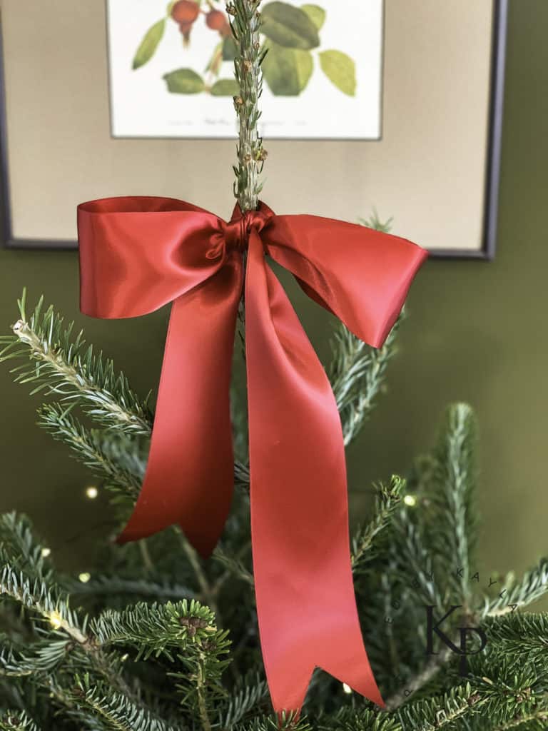 Christmas tree with red satin bow