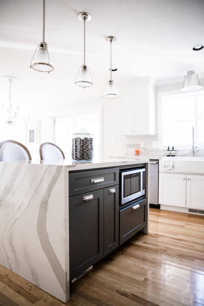 kendall charcoal kitchen cabinets with marble water fall