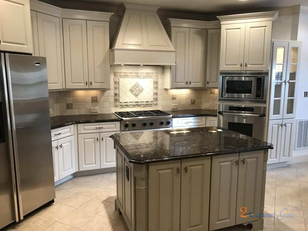 brand new kitchen with cabinets painted in ben moore's edgecomb 