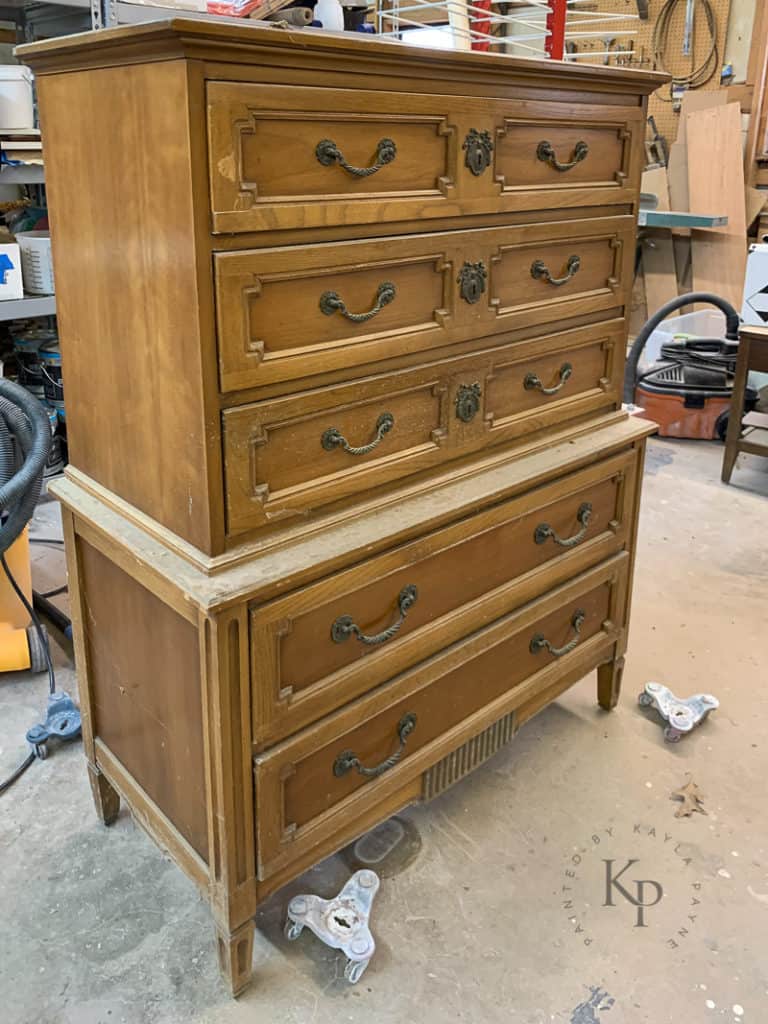 Vintage Thomasville chest of drawers with brass bow details on hardware 