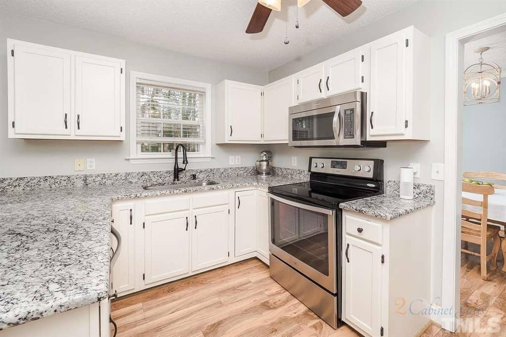 off white kitchen cabinets painted in creamy by sherwin williams 