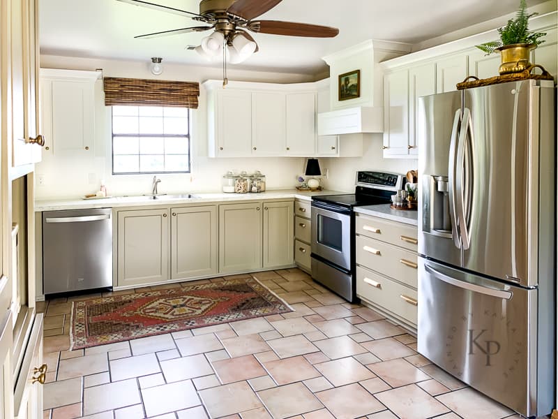 Two tone kitchen cabinets with white and griege