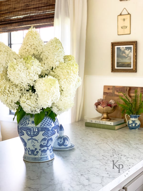 limelight hydrangea arrangement in blue and white jar