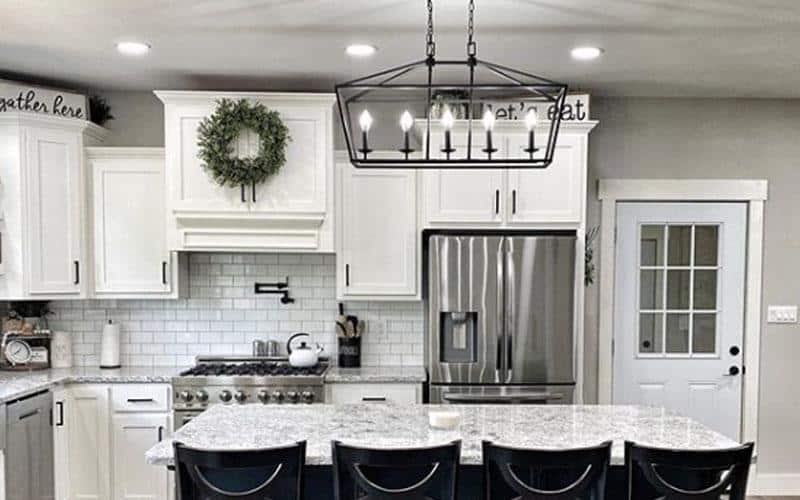 https://www.paintedbykaylapayne.com/wp-content/uploads/2021/08/White-farmhouse-kitchen.jpeg