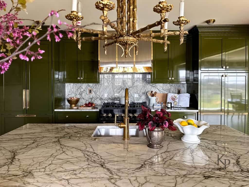 single chandelier over kitchen island. vintage brass faux bamboo chandelier