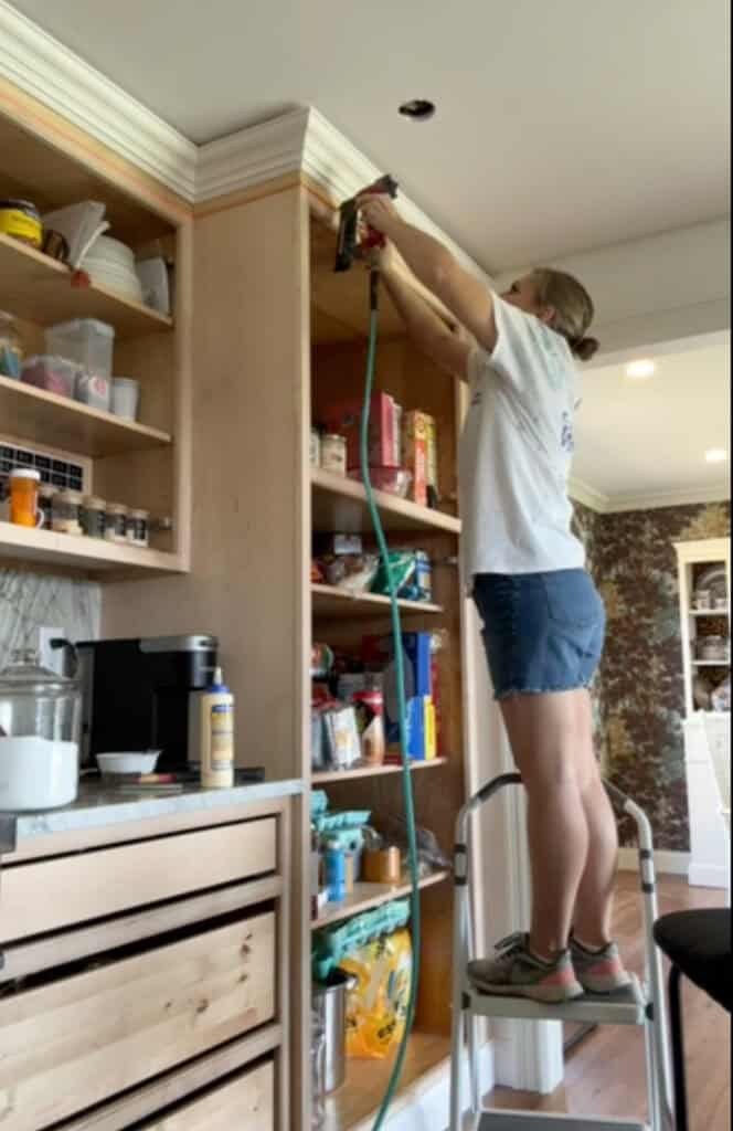 DIY crown molding onto cabinet joint cabinets